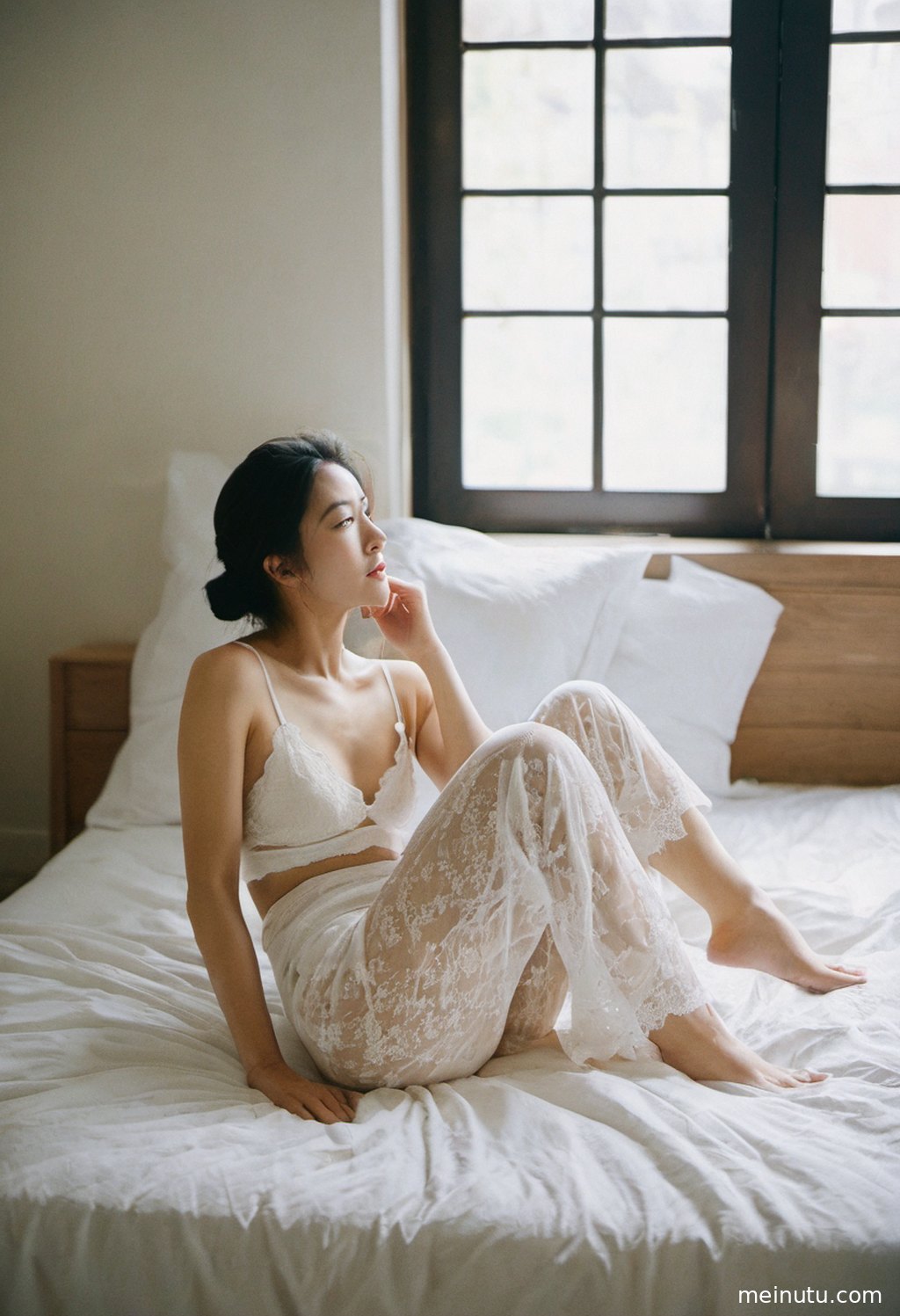 A candid urban moment of an adult woman in warm side light, creating an intimate and elegant portrait mood.